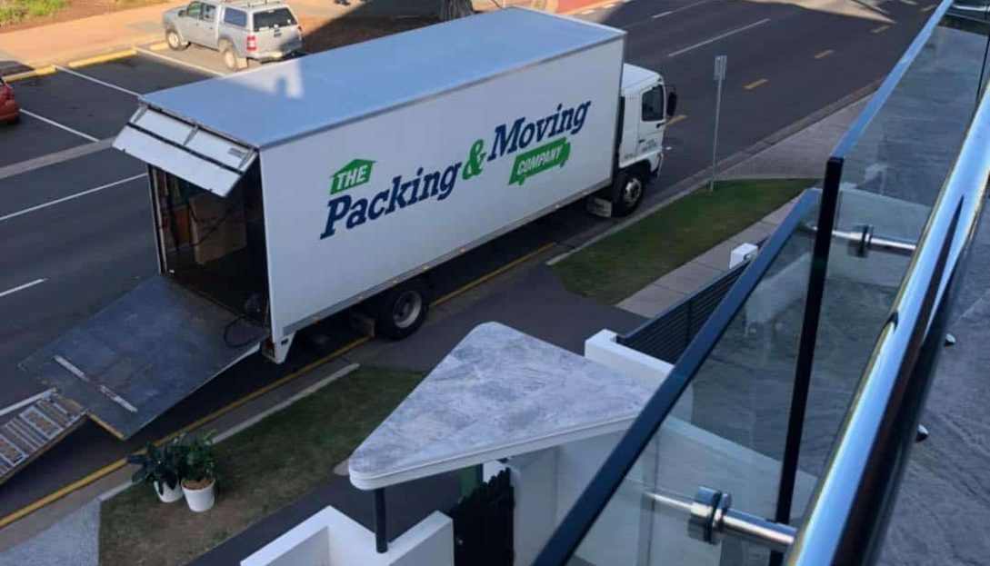 Removalist Truck With Ramp Extended — The Packing & Moving Company in Tanah Merah, QLD