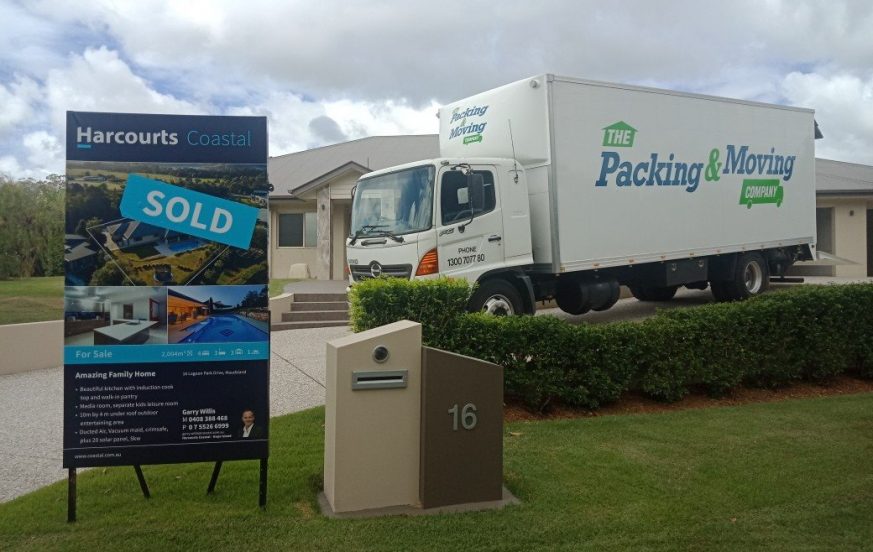 Moving Truck Parked at a Customer's New House — The Packing & Moving Company in Tanah Merah, QLD